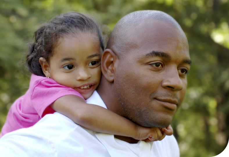 foster dad giving piggy back ride to daughter